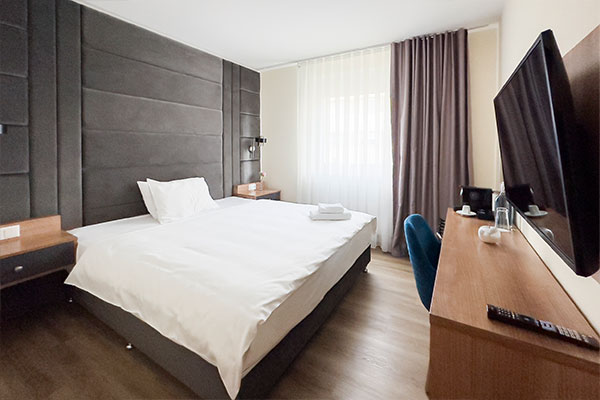 Gemütlicher Schlafbereich im O&O Hotel
